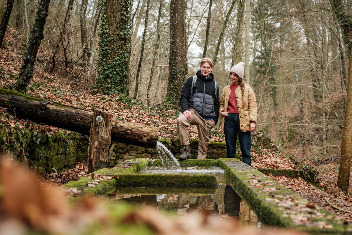 Exploring a historic spring on Route 2 of the Mullerthal Trail