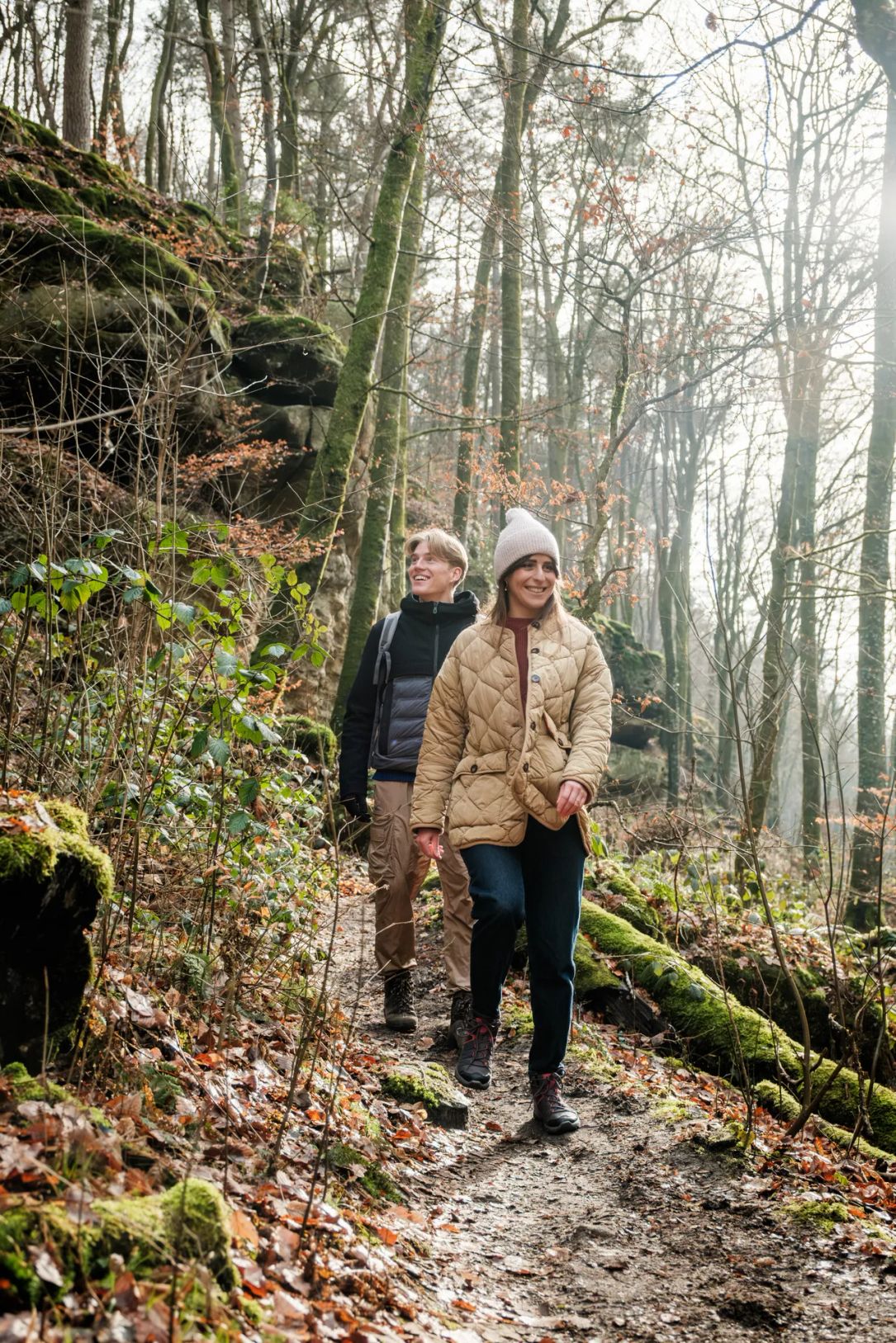 Hikers on the Mullerthal Trail Route 2 in Scheidgen near the "Härgottskapp"